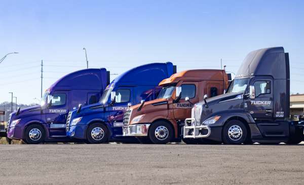 Tucker Freight Semi Trucks staggered outside