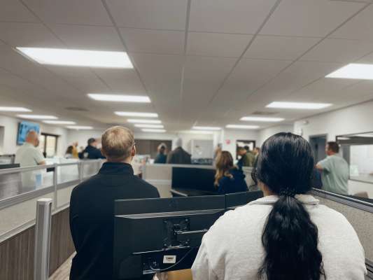Graduates of Our Leadership Training Program together holding up awards.